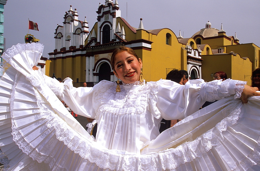 A colonial city on Peru's north coast the Tribute to the Flag Parade on Plaza de Armas dancer in colonial dress typical of Trujillo, Trujillo, Peru