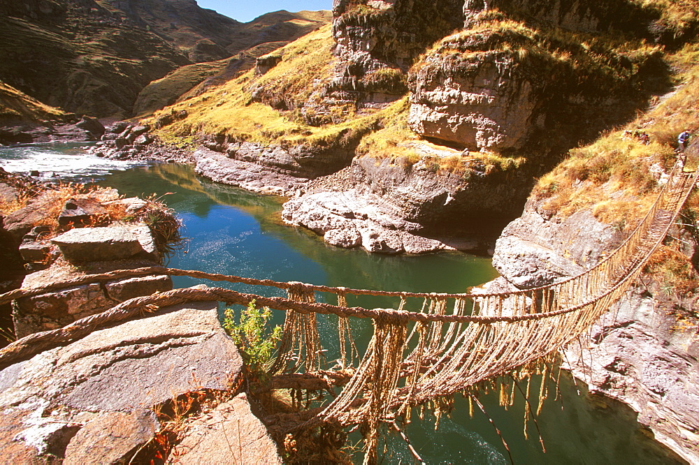 Famous Incan grass-rope suspension bridge across Apurimac River, rebuilt annually since Incan period and only one still in existence, Inca Road, Altiplano, Peru