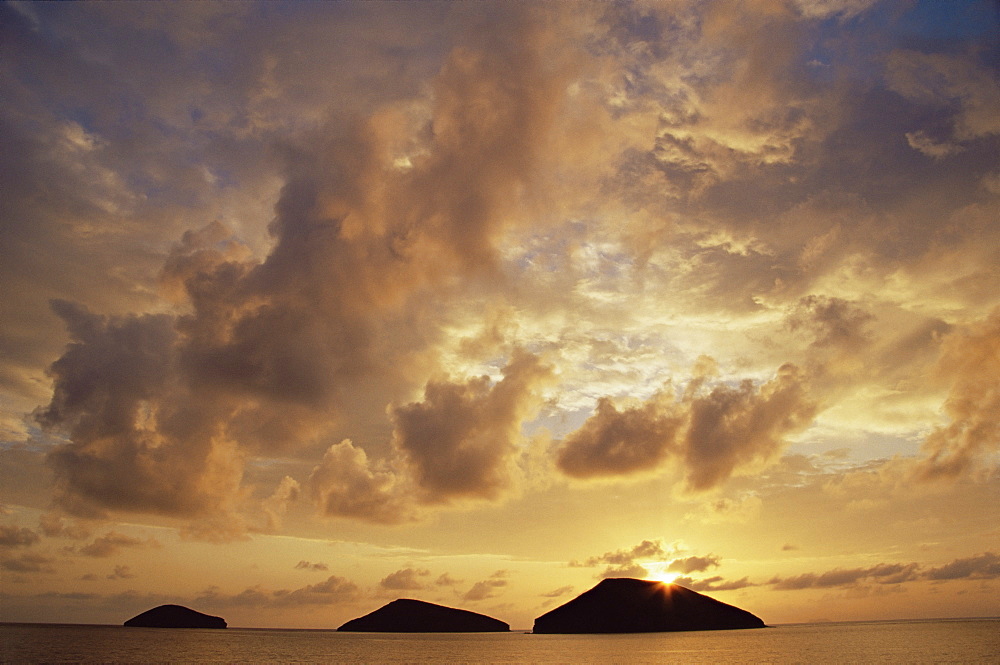 Sunrise behind Bainbridge Rocks, off James Island, Galapagos Islands, UNESCO World Heritage Site, Ecuador, Pacific, South America