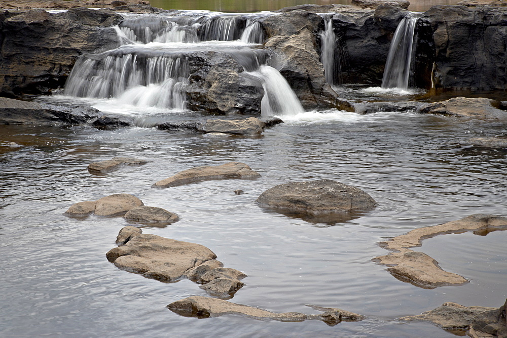 Waterfall and pool with rocks, Bourke's Luck Potholes, South Africa, Africa