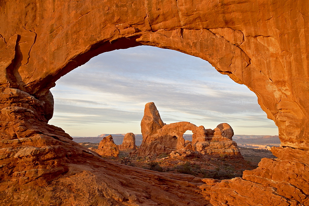 Turret Arch through North Window at dawn, Arches National Park, Utah, United States of America, North America