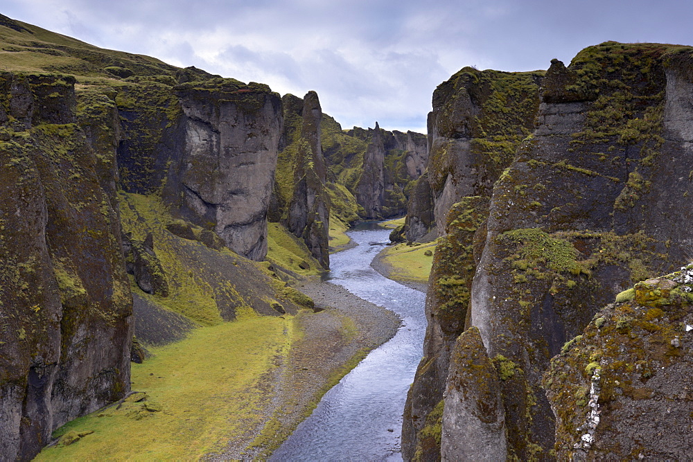 Fjadrargljufur Canyon, 100m deep and 2 km long, carved out of palagonite and lava layers by glacial river two million years ago, near Kirkjubaejarklaustur, South Iceland, Iceland, Polar Regions