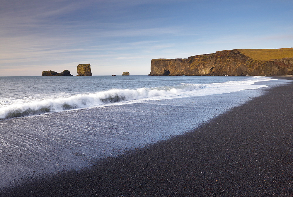 Black sand beach and Dyrholaey natural arch near Vik, south Iceland, Iceland, Polar Regions