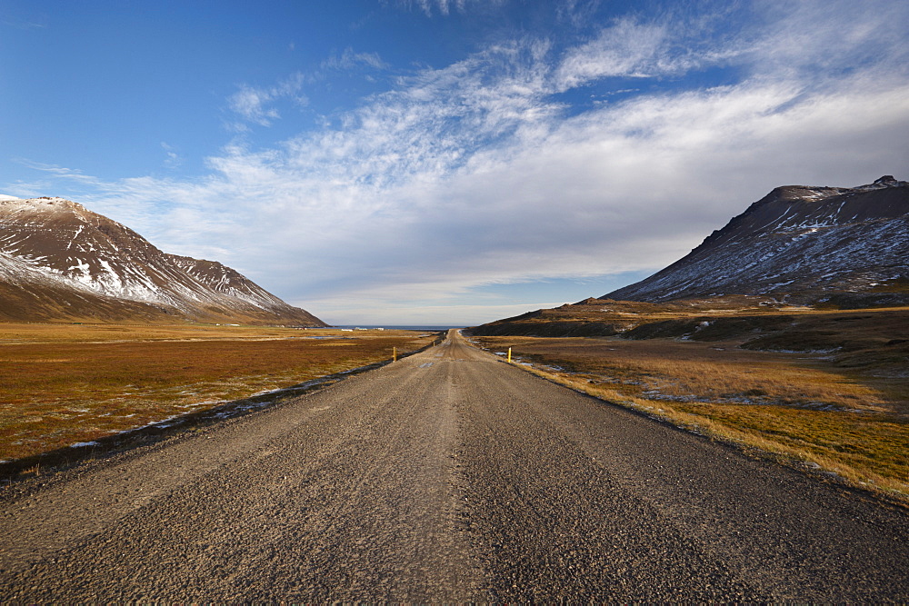 Road 94 in Njardvik valley, Borgarfjordur Eystri fjord in the distance, East Fjords area, Iceland, Polar Regions