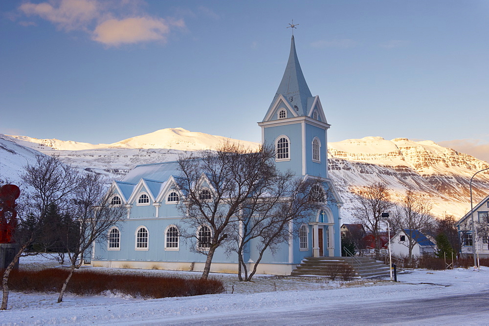 Traditional wooden church, built in 1922, at Seydisfjordur, a town founded in 1895 by a Norwegian fishing company, now main ferry port to and from Europe in the East Fjords, Iceland, Polar Regions