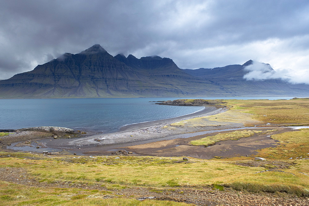 Mount Bulandstindur, 1069m, pyramid shaped stack of basaltic strata, in Berufjordur, East Fjords, Iceland, Polar Regions