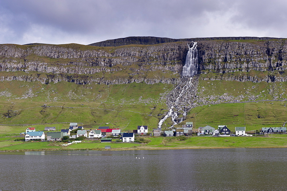 Houses at Sandur, across Sandsvatn lake, Sandoy, Faroe Islands (Faroes), Denmark, Europe