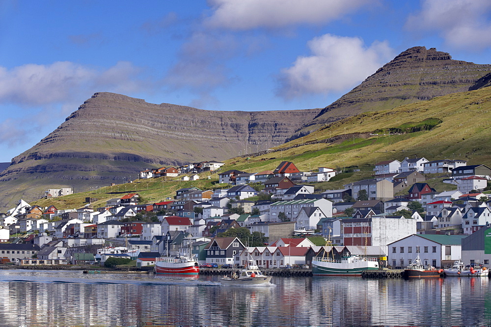 Fishing boats in Klaksvik harbour and views of Klaksvik, the second largest town in the Faroes, Bordoy Island, Nordoyar, Faroe Islands (Faroes), Denmark, Europe