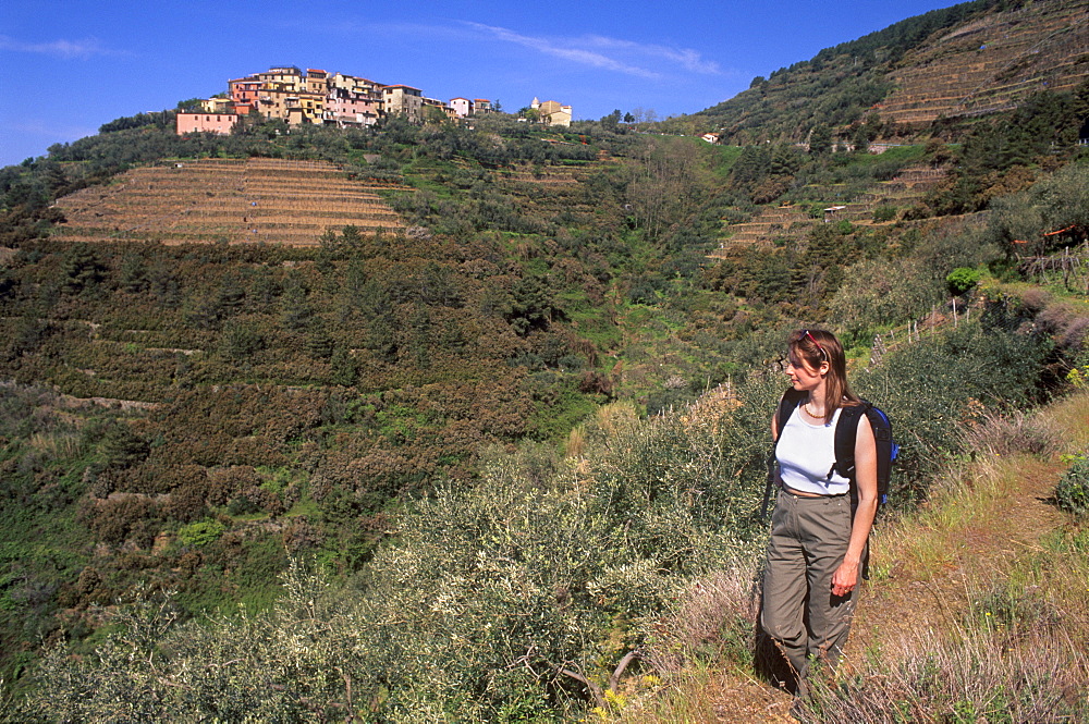 Woman enjoying a walk in Cinque Terre National Park, UNESCO World Heritage Site, Cinque Terre, Liguria, Italy, Europe