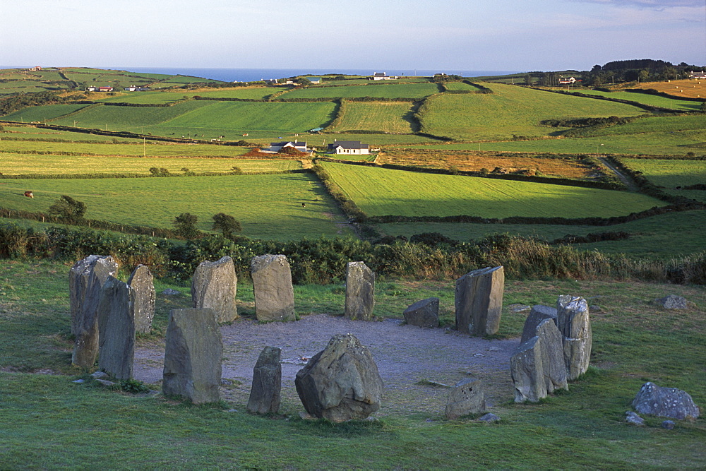 Drombeg Stone Circle, circa 200 B.C., comprising 17 stones, and nearby cooking and hut site, near Glandore, County Cork, Munster, Republic of Ireland, Europe