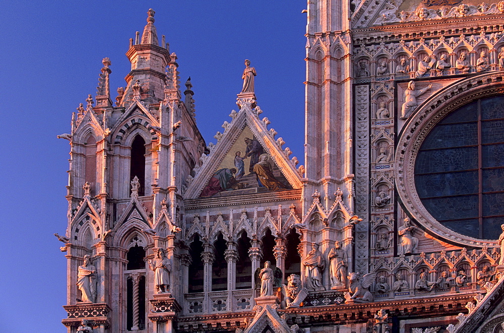 Facade and pinnacles of the Duomo, Siena, UNESCO World Heritage Site, Tuscany, Italy, Europe