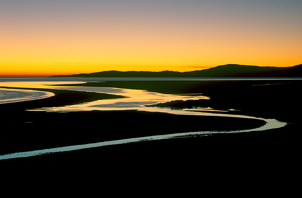 Sunset over Luskentyre Bay, at low tide, west coast of South Harris, Outer Hebrides, Scotland, United Kingdom, Europe