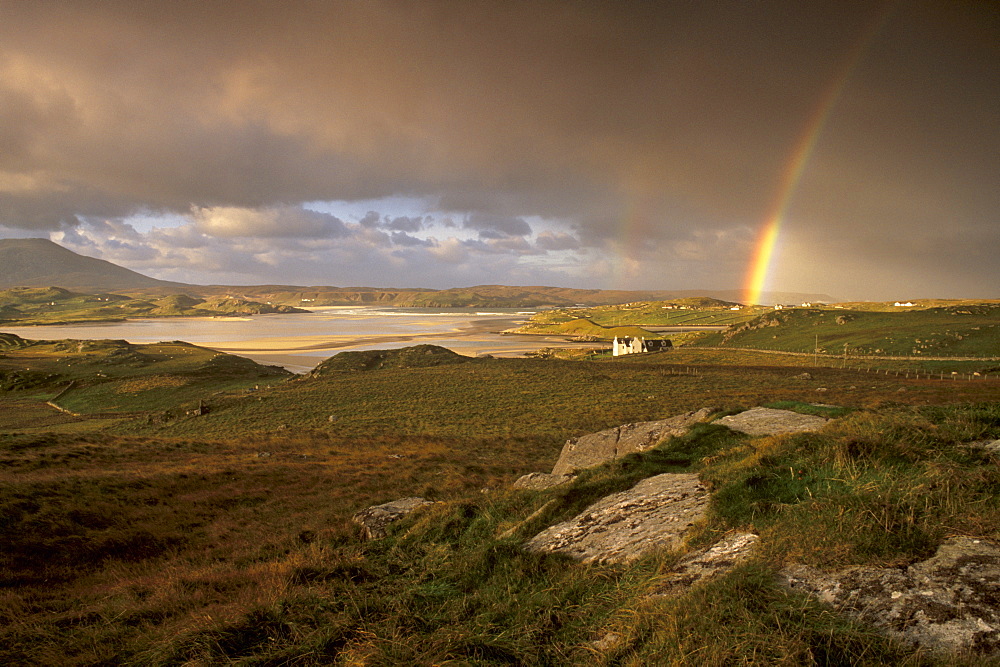 Rainbow over Uig sands (Traigh Chapadail), tidal area, from near Timsgarry, Isle of Lewis, Outer Hebrides, Scotland, United Kingdom, Europe