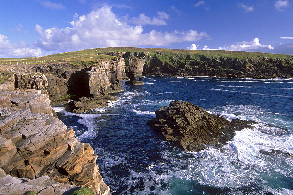 Rocky coast of Mainland with Yesnaby castle, a sea stack, Mainland, Orkney Islands, Scotland, United Kingdom, Europe