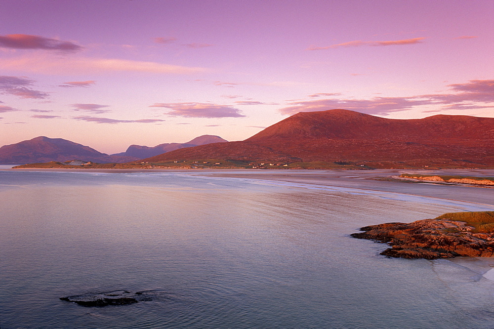 Luskentyre Bay and Sound of Taransay at sunset, South and North Harris hills behind, South Harris, Outer Hebrides, Scotland, United Kingdom, Europe