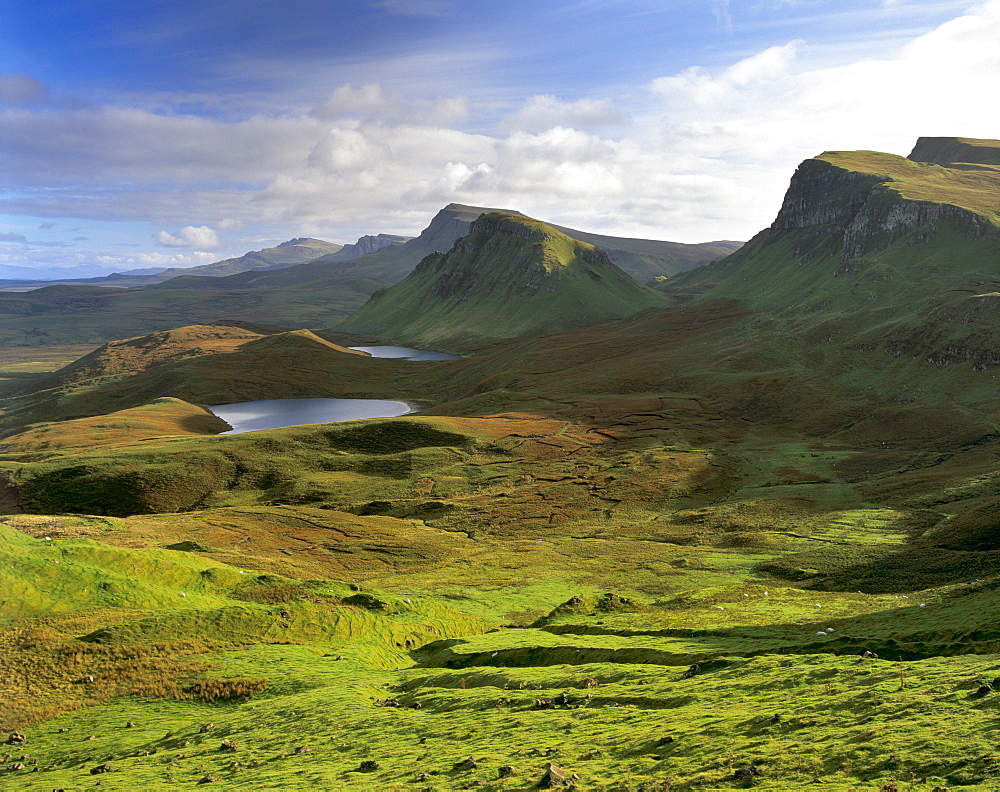 Slopes of the Quiraing, a geological wonder, its distinctive features resulting from landslips of basalt lavas upon softer sedimentary rocks beneath, northeast coast of Trotternish Peninsula, Isle of Skye, Inner Hebrides, Scotland, United Kingdom, Europe