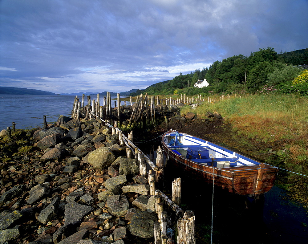 Boat, house and Loch Fyne near Furnace, Argyll, Scotland, United Kingdom, Europe