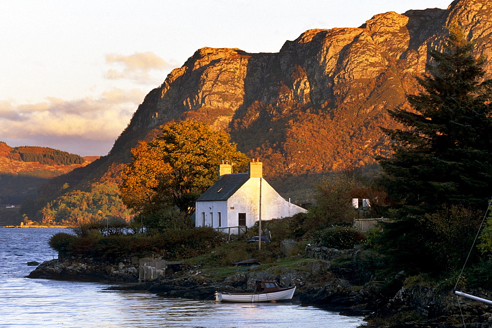 Cottage and hills at sunset, Plockton, Highland region, Scotland, United Kingdom, Europe