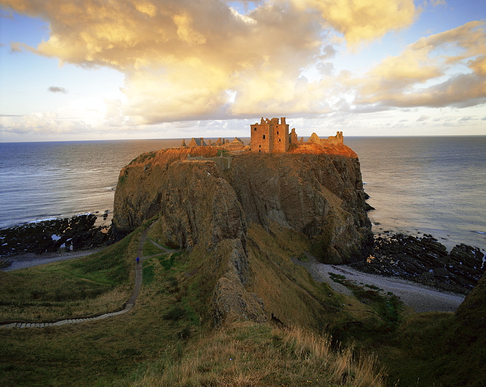 Dunnottar Castle, dating from the 14th century, at sunset, Aberdeenshire, Scotland, United Kingdom, Europe