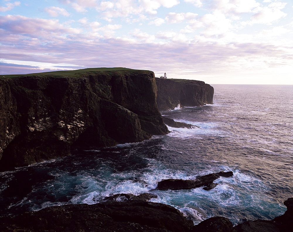 Sunset over Eshaness basalt cliffs, Eshaness, Northmavine, Shetland Islands, Scotland, United Kingdom, Europe