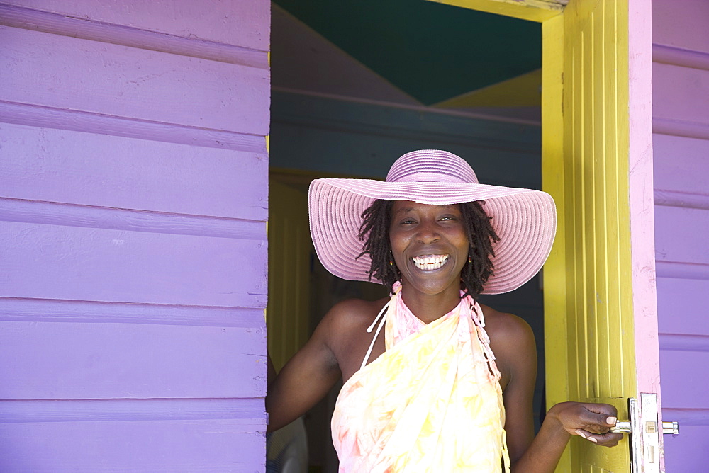 Jamaican woman in pink hat, Negril, Jamaica, West Indies, Caribbean, Central America