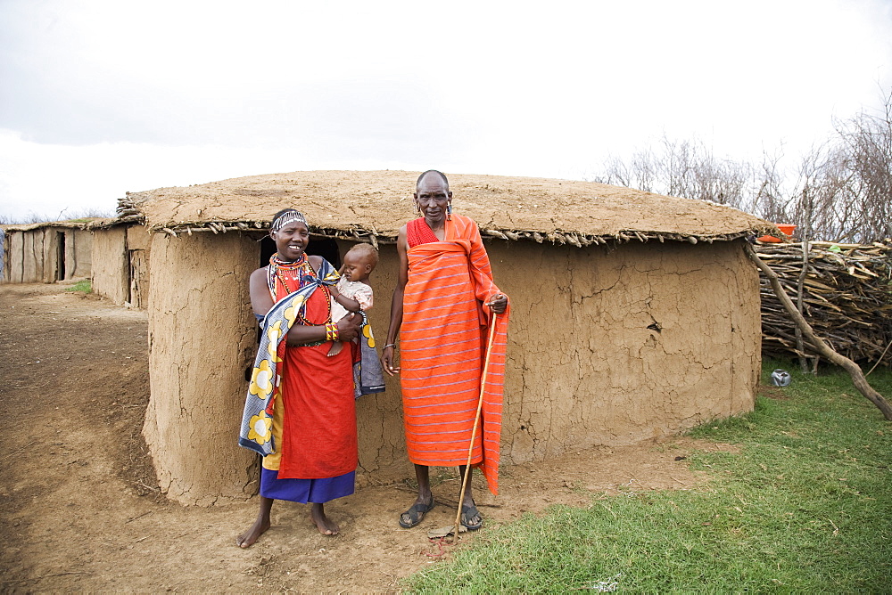 Masai couple and baby, Masai Mara National Reserve, Kenya, East Africa, Africa