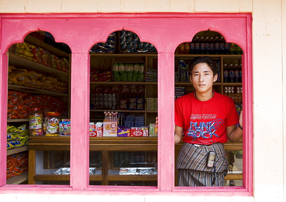 Young shop owner, village of Wangdue Phodrang, Bhutan, Asia