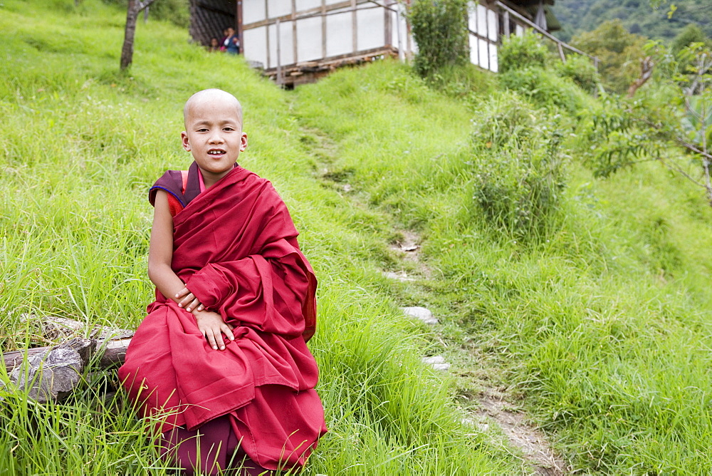 Young Buddhist monk, Karchu Dratsang Monastery, Bumthang, Bhutan, Asia