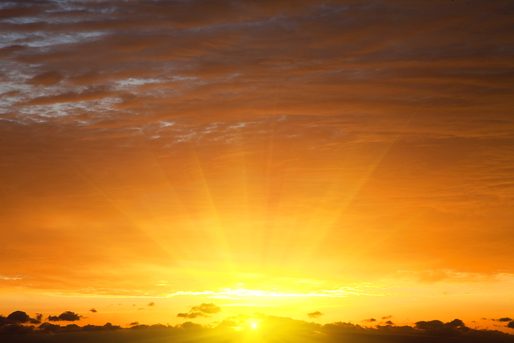 Red sky at sunrise over Atlantic Ocean, view from Miami Beach, Florida, United States of America, North America