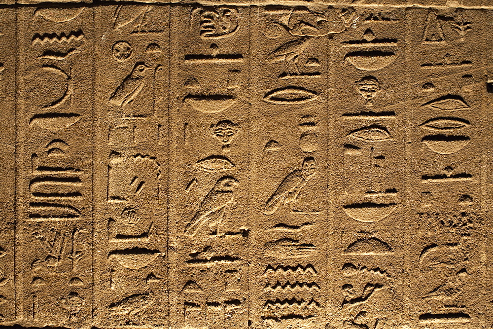 Hieroglyphs adorn the walls of the Temple of Philae, UNESCO World Heritage Site, near Aswan, Egypt, North Africa, Africa