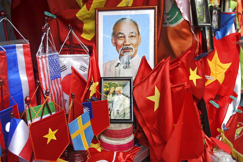 Vietnamese flags and portraits of Ho Chi Minh in a tourist shop, Hanoi, Vietnam, Indochina, Southeast Asia, Asia