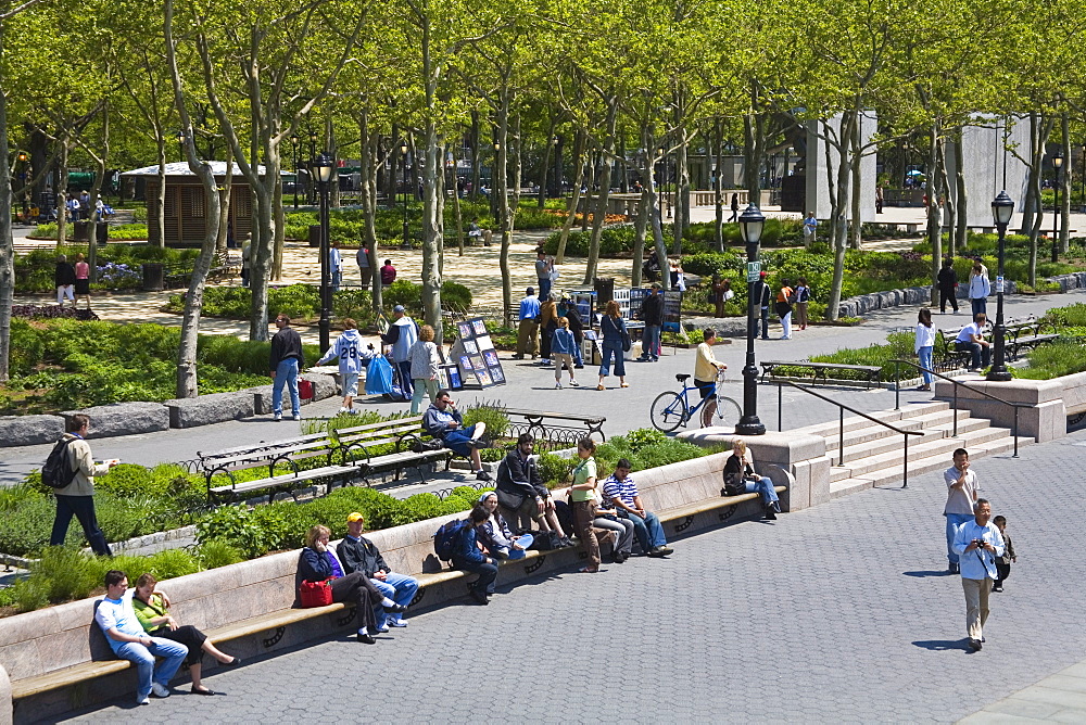 People relaxing in Battery Park, Lower Manhattan, New York City, New York, United States of America, North America