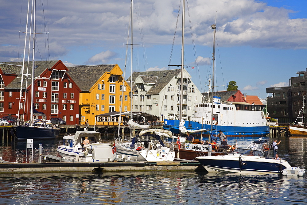 Boats and warehouses on Skansen Docks, Tromso City, Troms County, Norway, Scandinavia, Europe