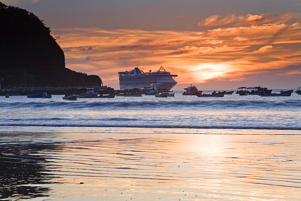 Cruise ship at sunset in San Juan Del Sur, Department of Rivas, Nicaragua, Central America