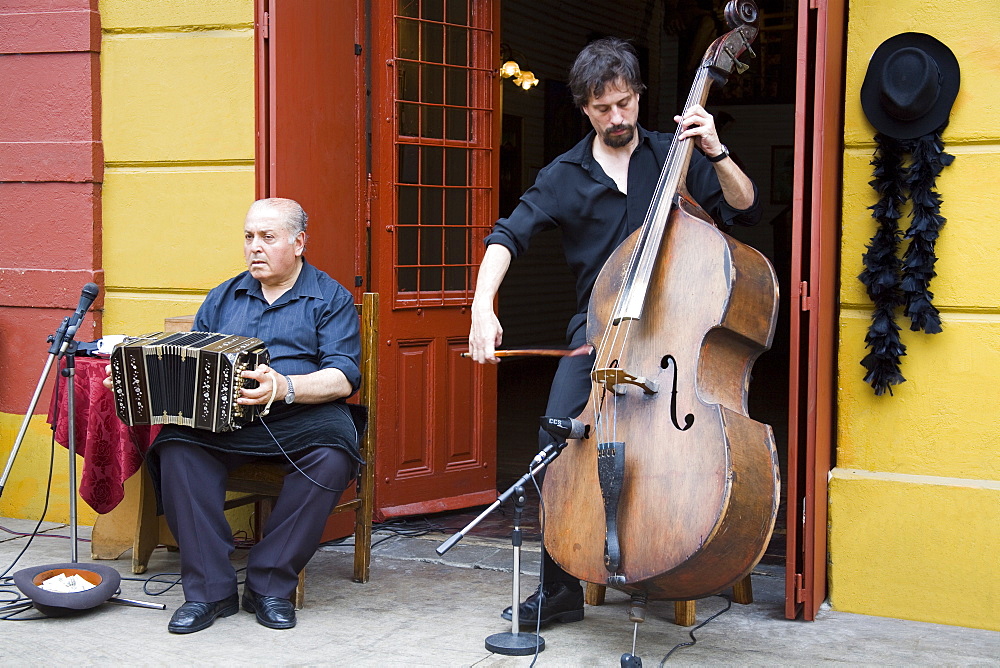 Musicians on El Caminito street in La Boca District of Buenos Aires, Argentina, South America