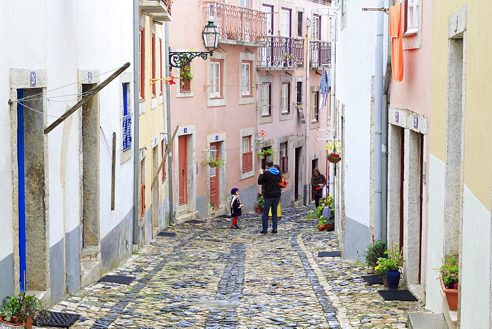 Narrow street in the Castelo District, Lisbon, Portugal, Europe