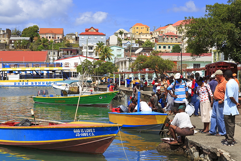 Selling fish in The Carenage, St. Georges, Grenada, Windward Islands, West Indies, Caribbean, Central America