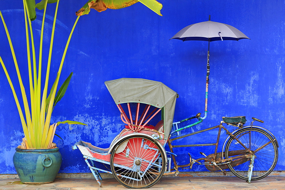 Rickshaw in Cheong Fatt Tze Mansion, Georgetown, Penang Island, Malaysia, Southeast Asia, Asia