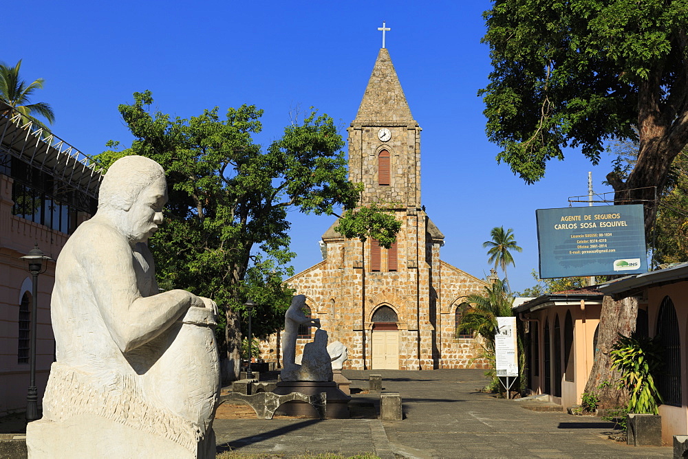 Sculpture by Rodolfo Ramirez and Cathedral, Puntarenas City, Costa Rica, Central America