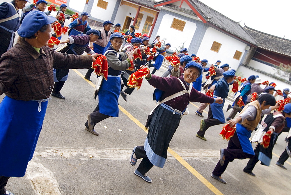 Naxi women dancing, Baisha, Yunnan, China, Asia