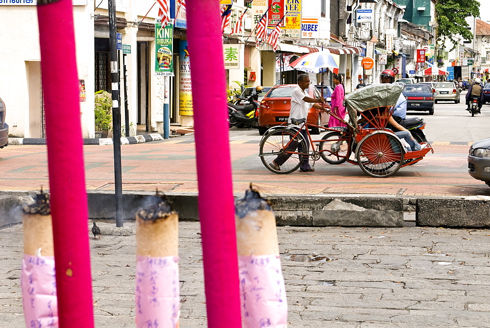 Trishaw and incense, Georgetown, Penang, Malaysia, Southeast Asia, Asia