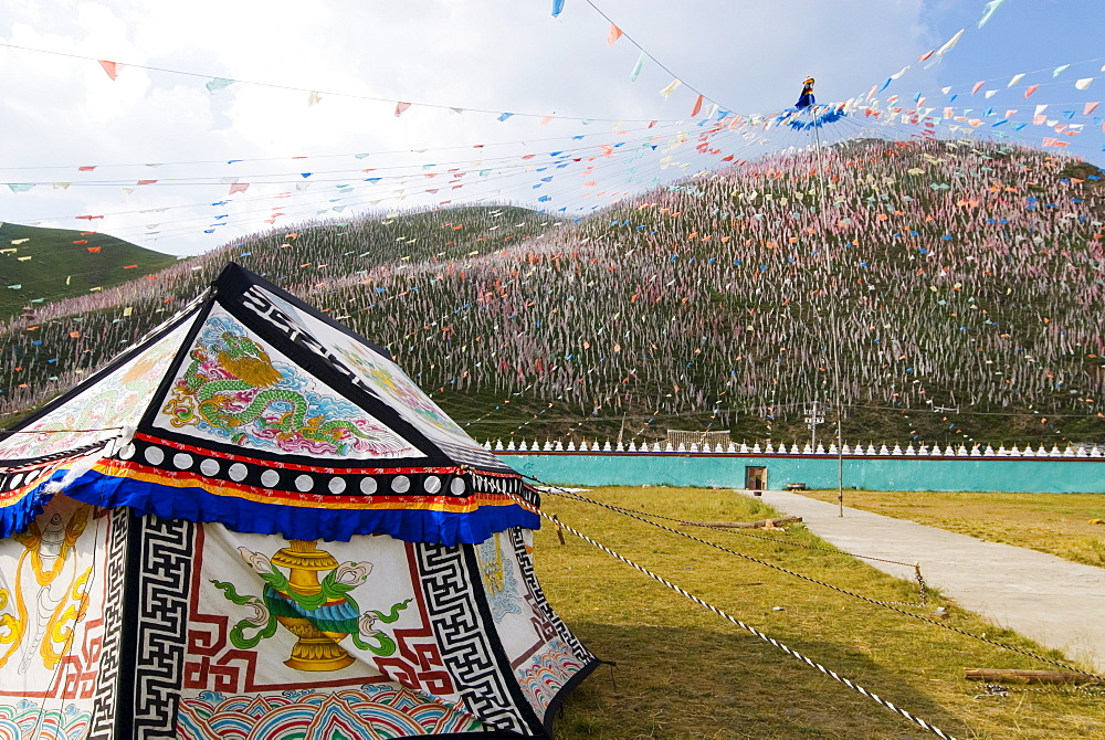 Tent and thousands of prayer flags, Tagong Grasslands, Sichuan, China, Asia