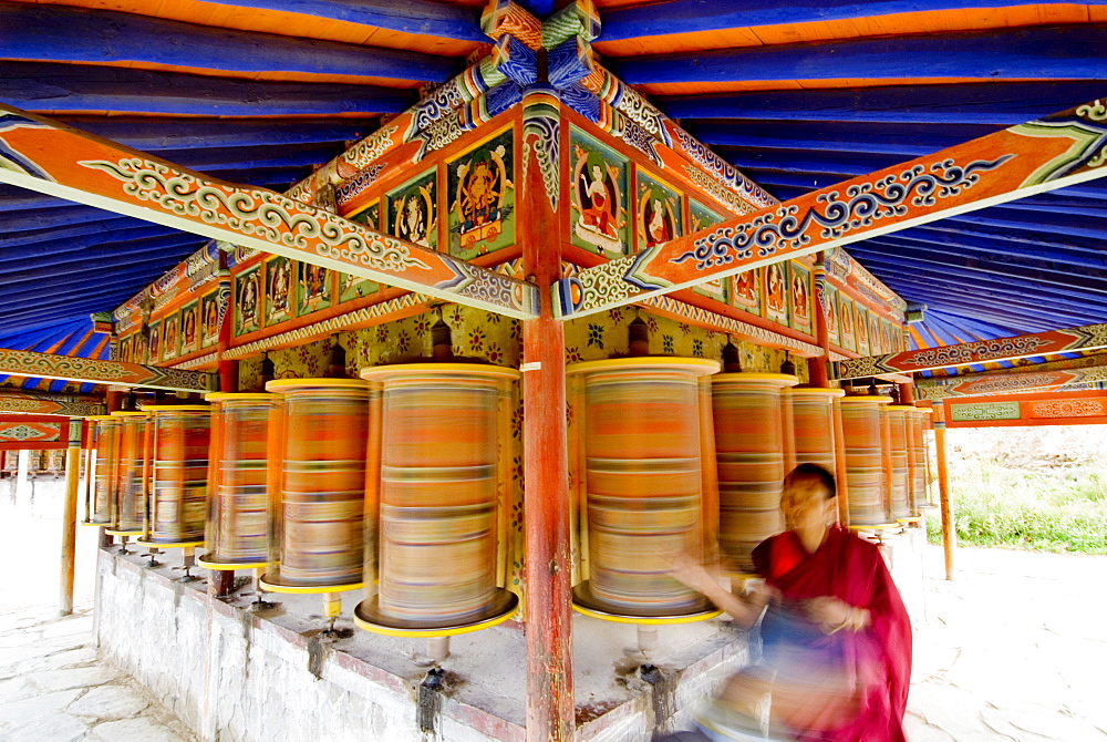 Spinning prayer wheels, Xiahe monastery, Xiahe, Gansu, China, Asia