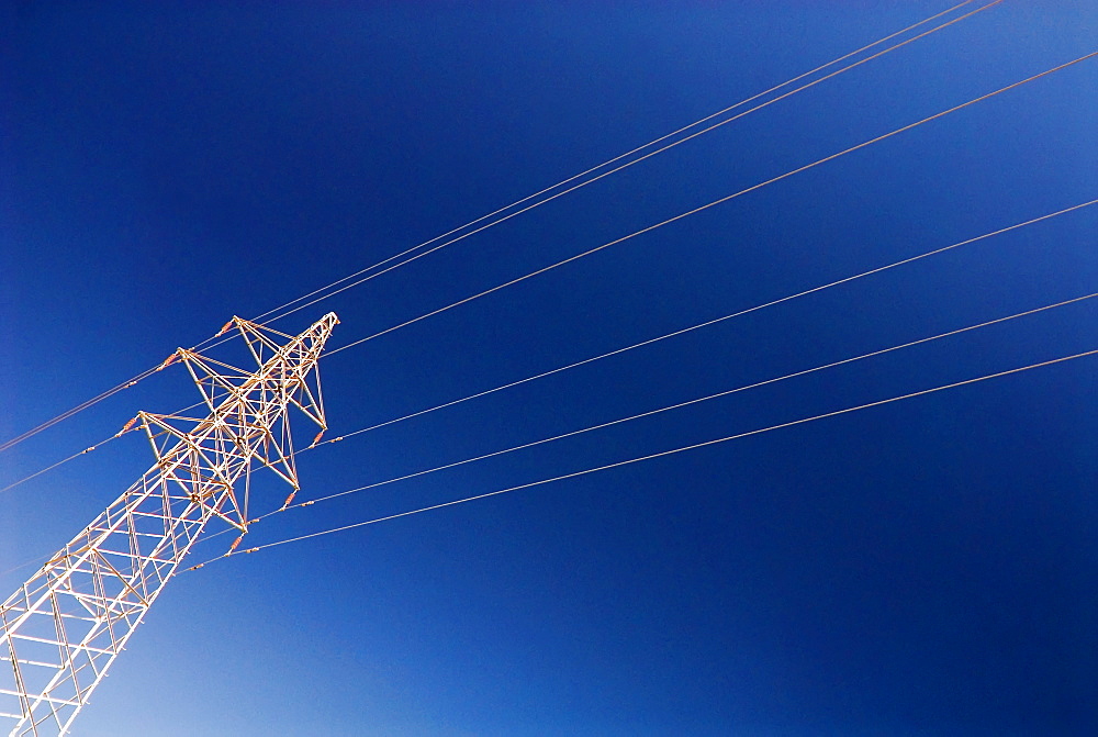 Electricity pylon against blue sky, Dunhuang, Gansu, China, Asia