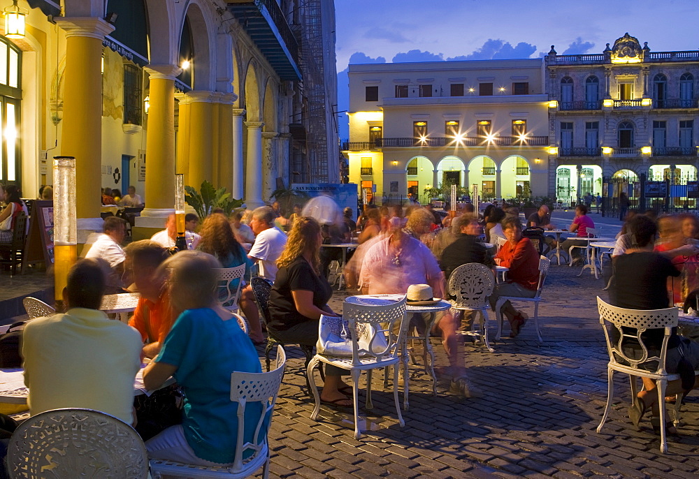 Eating al fresco in the evening, Plaza Vieja, Old Havana, Cuba, West Indies, Central America