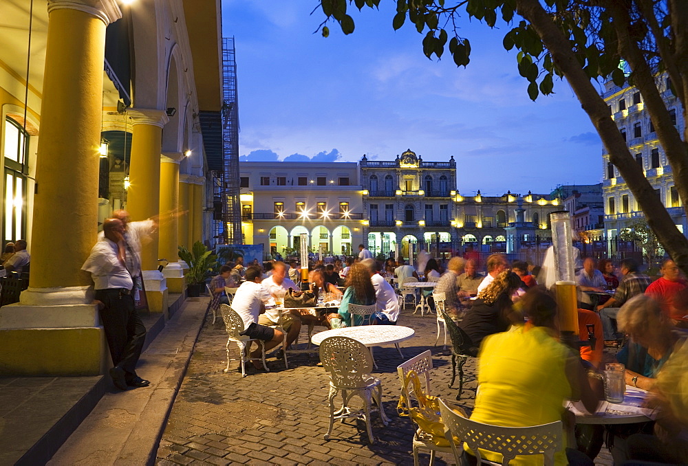 Eating al fresco in the evening, Plaza Vieja, Old Havana, Cuba, West Indies, Central America