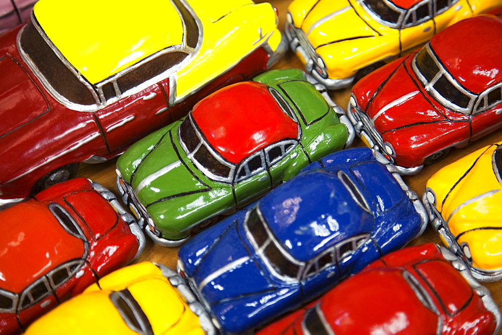 Rows of colourful model traditional American cars for sale to tourists, Old Havana, Cuba, West Indies, Central America