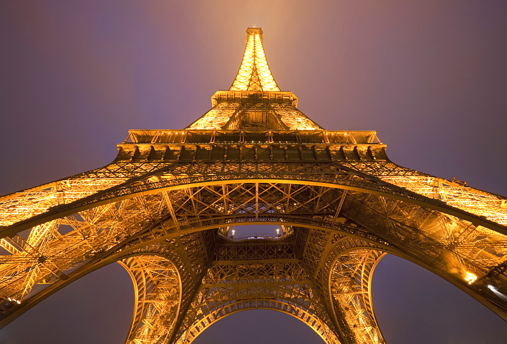 Wide view of the Eiffel tower at night, Paris, France, Europe