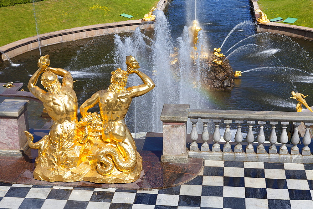 Golden statues and fountains of the Grand Cascade at the Peterhof Palace, St. Petersburg, Russia, Europe