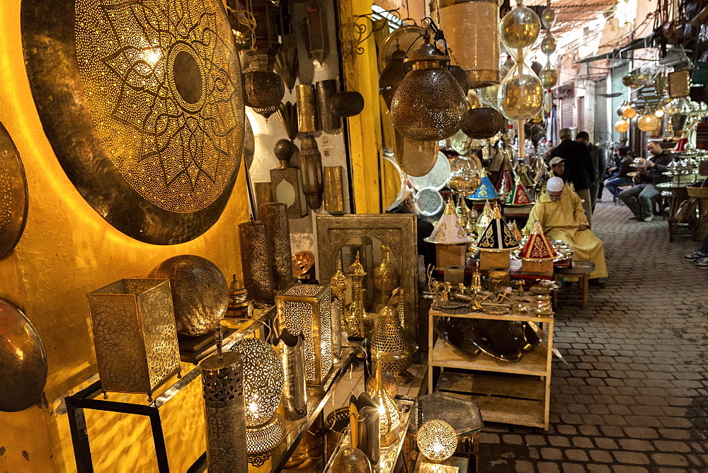 Shop selling traditional metal lamps and trays in the souks, Marrakech, Morocco, North Africa, Africa